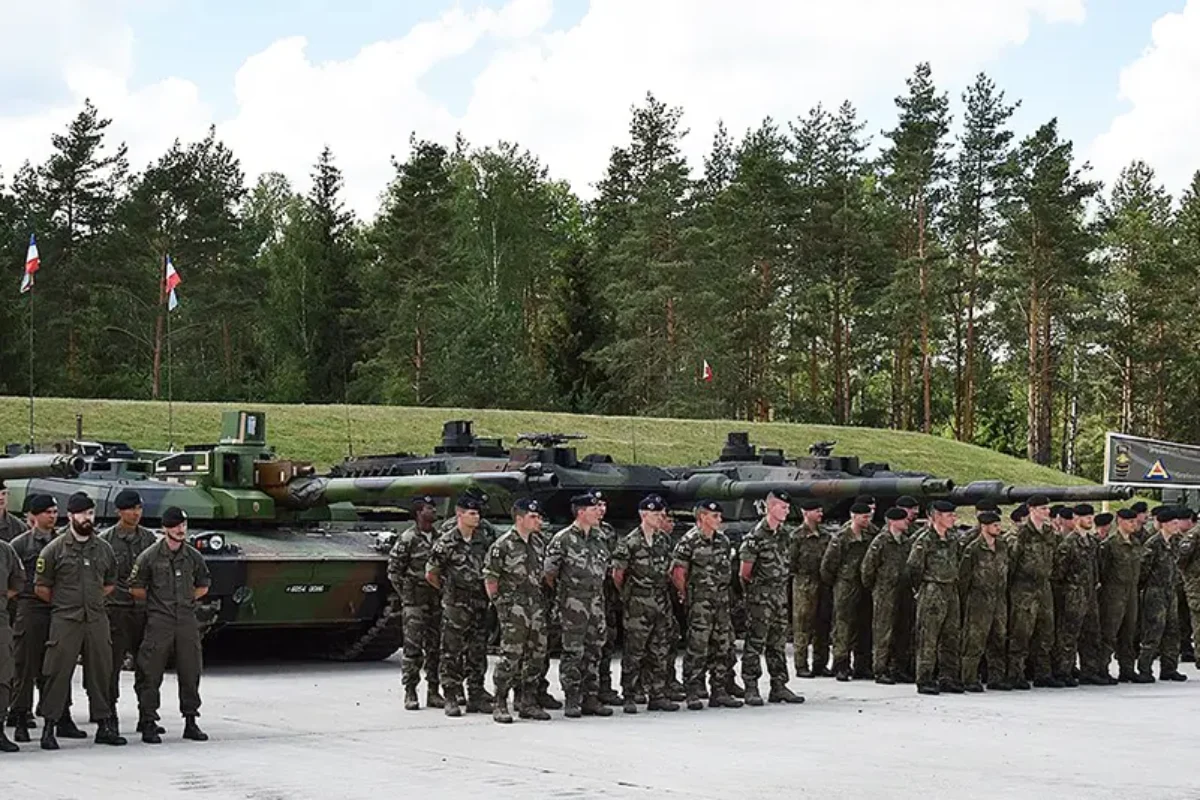 Polish, German. Austrian, and French tank crew during a training exercise at the Grafenwörth training facility in Austria.